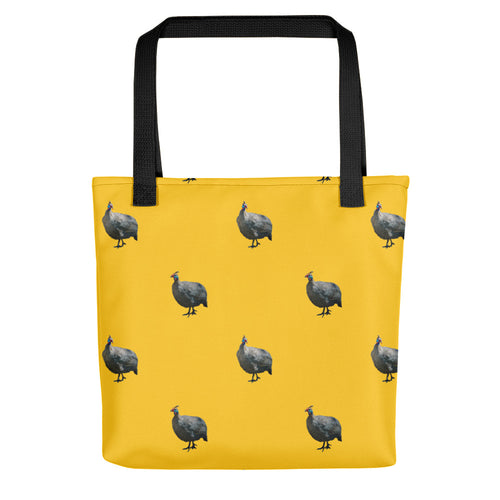 Sturdy yellow tote bag with guinea fowl and a black handle.