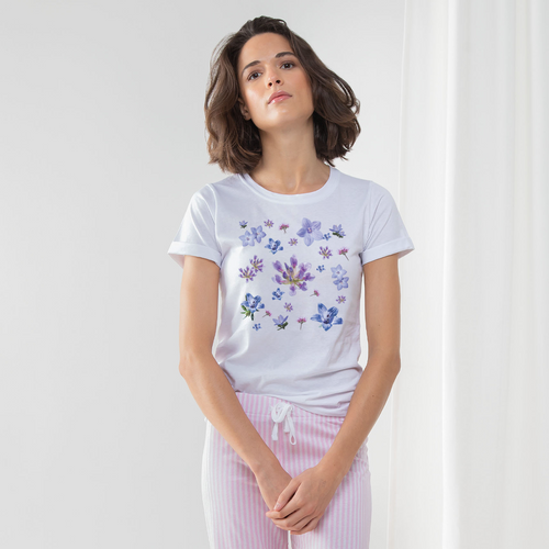 Ladies pyjama set with blue & purple floral pattern on the front of a white t-shirt & pink bottoms