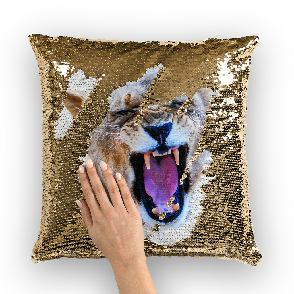 Gold sequinned cushion that has a hidden large print yawning lion when swiped