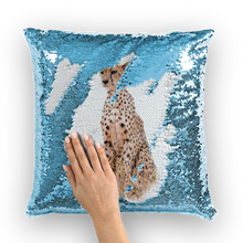 Load image into Gallery viewer, Blue sequinned cushion that has a hidden large print cheetah when swiped
