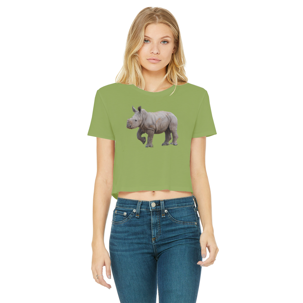 a girl wearing a green round necked crop top with a rhino.