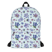 Load image into Gallery viewer, Front of light blue backpack with a blue and purple floral pattern
