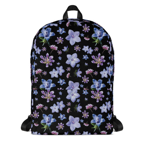 Black floral backpack in a water resistant material from the front.