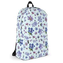 Load image into Gallery viewer, Side of light blue backpack with a blue and purple floral pattern
