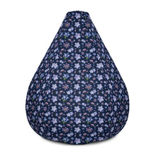 Load image into Gallery viewer, Back view of a dark navy bean bag chair with a blue and purple floral repeating pattern
