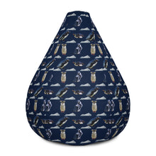 Load image into Gallery viewer, Front of dark navy bean bag chair with repeating pattern of penguins and icebergs
