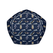 Load image into Gallery viewer, Bottom of dark navy bean bag chair with repeating pattern of penguins and icebergs
