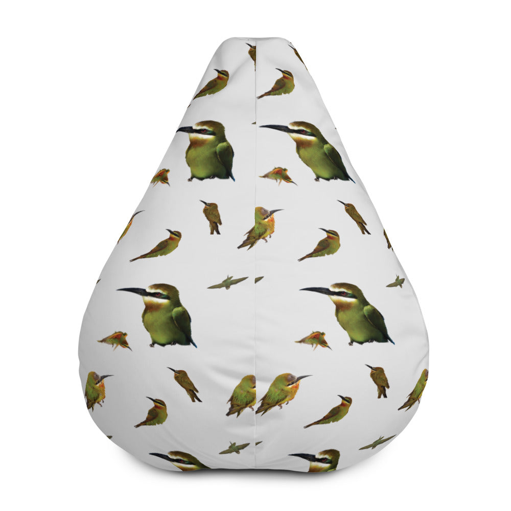Front view of a pale grey bean bag with madagascar bee eater birds printed in a repeating pattern