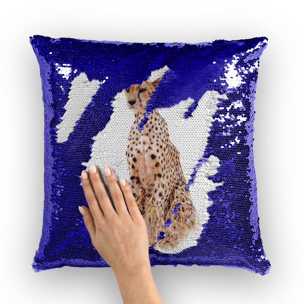 Purple sequinned cushion that has a hidden large print cheetah when swiped