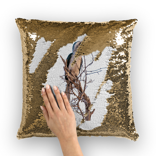 Gold sequinned cushion that has a hidden large print hornbill when swiped