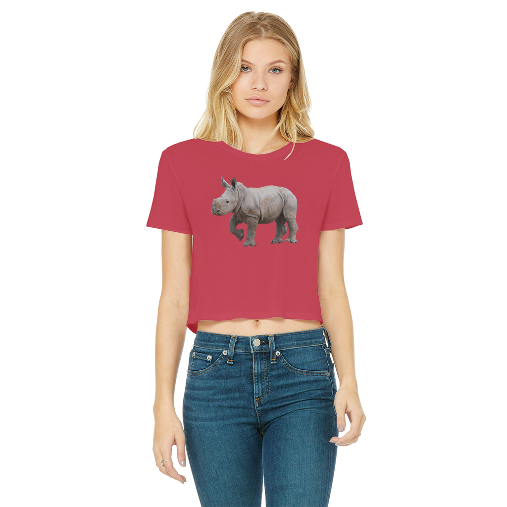 A woman wearing a red cropped tee with a rhino print