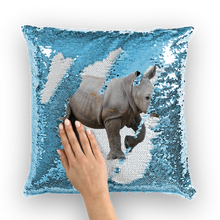 Load image into Gallery viewer, Blue sequinned cushion that has a hidden large print rhino calf when swiped
