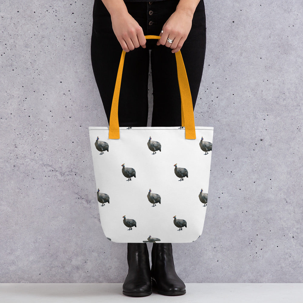 Guinea Fowl Tote Bag. Sturdy white tote bag with guinea fowl pattern and a yellow handle. 