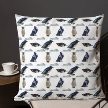 Load image into Gallery viewer, A white cushion with penguins and iceberg repeating pattern. 
