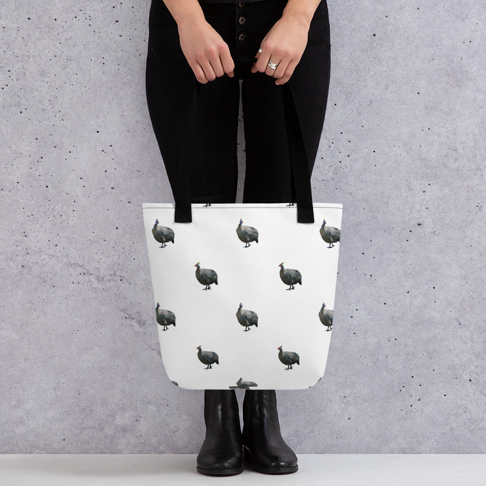 Guinea Fowl Tote Bag. Sturdy white tote bag with guinea fowl pattern and a black handle. 
